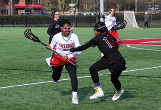 Madisen Patrick representing Cape Henry and taking charge of the lacrosse field.

